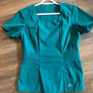 Jaanuu peplum scrub top